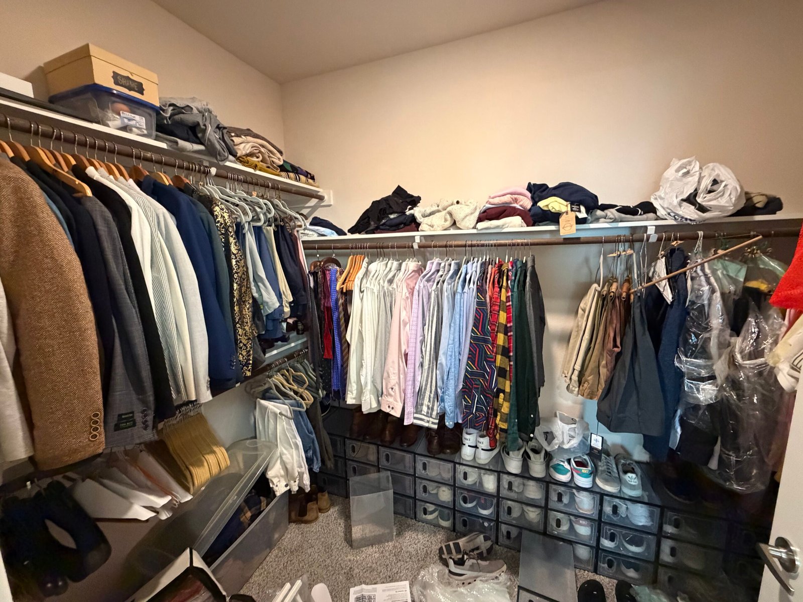 Cluttered closet before Top Tier Tidying organized it