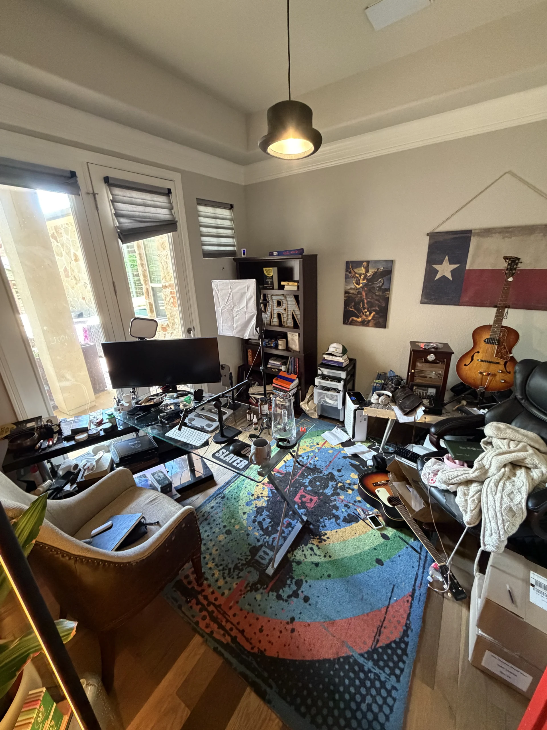 Cluttered home office before Top Tier Tidying organized it