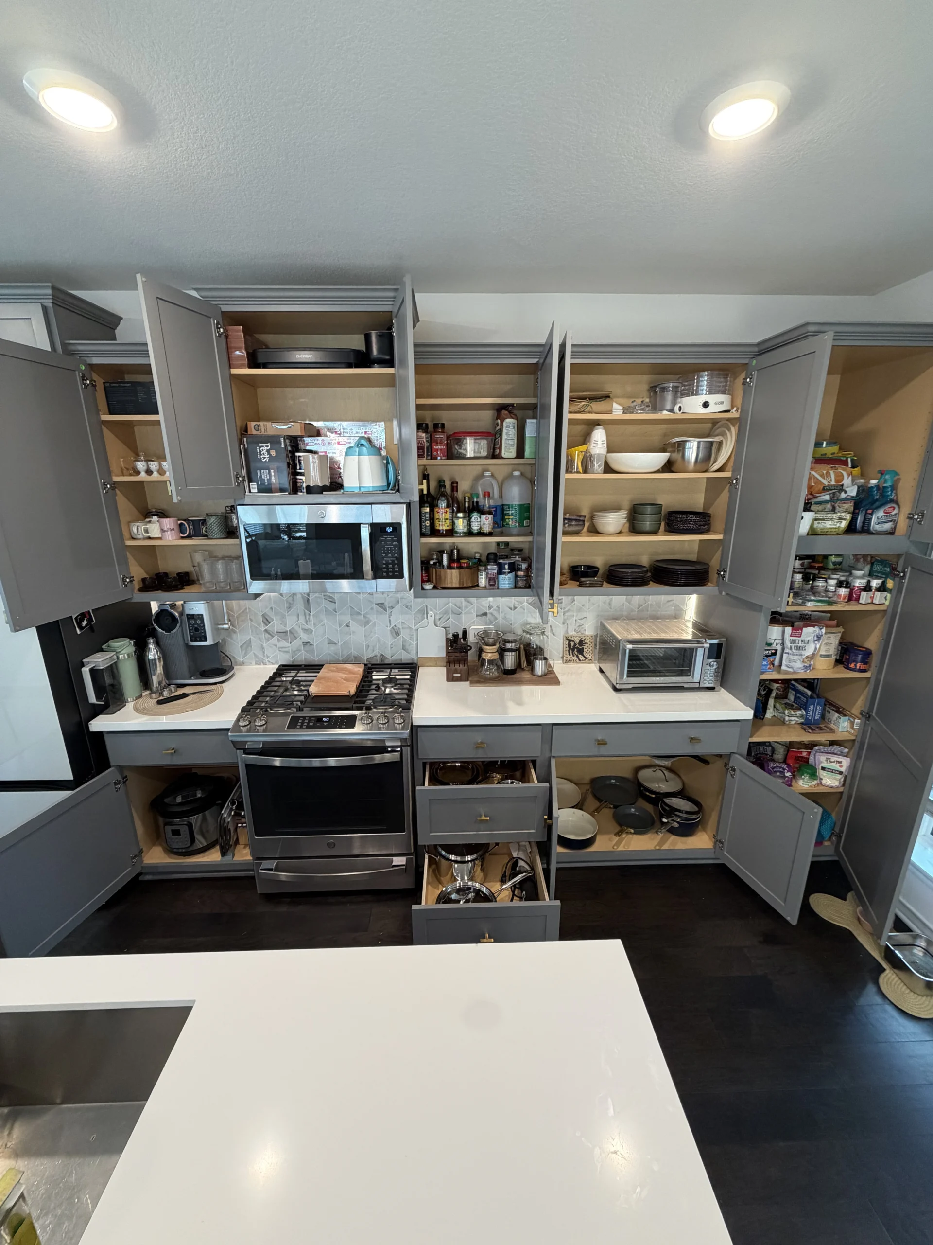 Cluttered pantry or kitchen before Top Tier Tidying organized it
