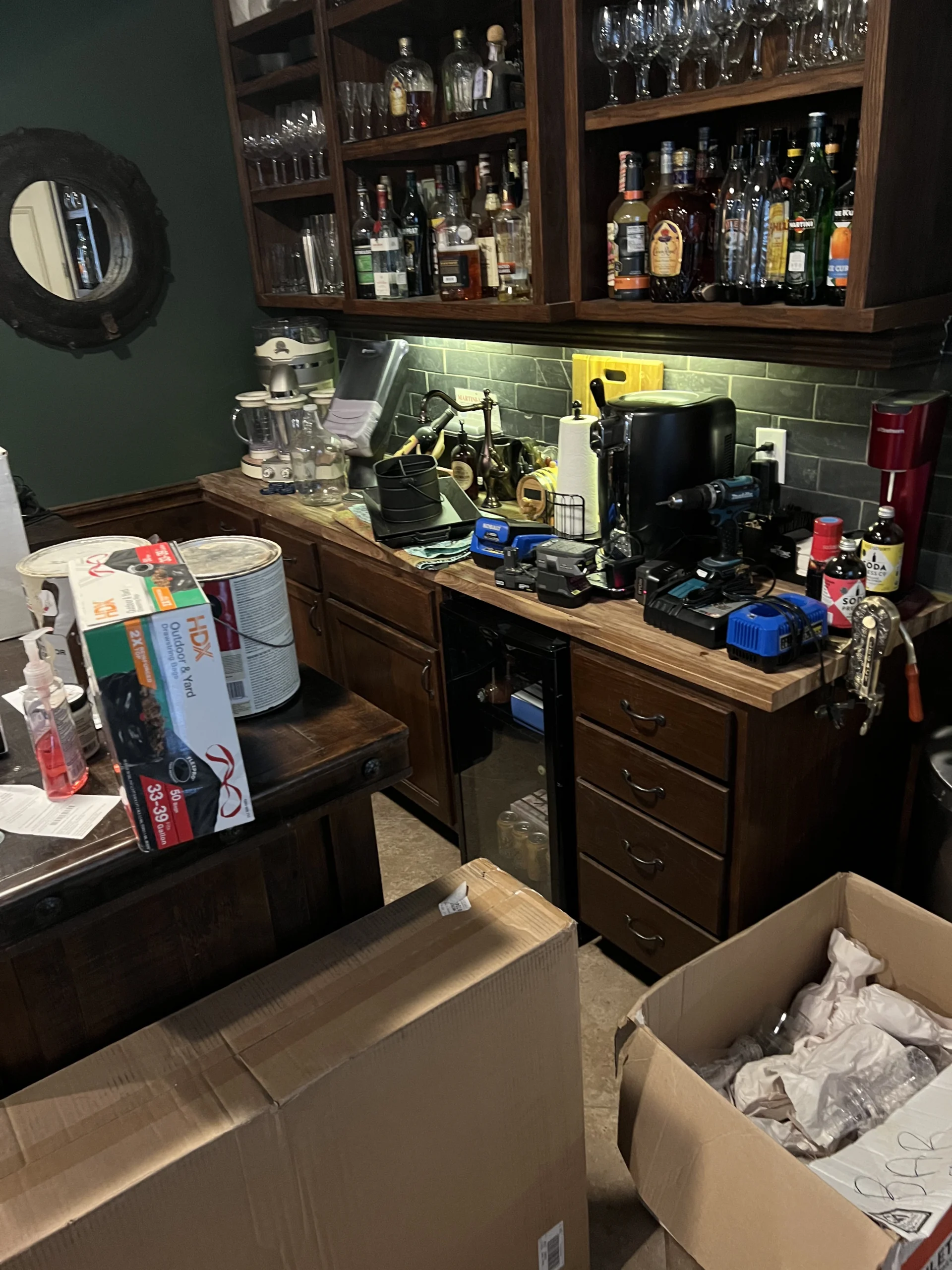 Cluttered pantry or kitchen before Top Tier Tidying organized it