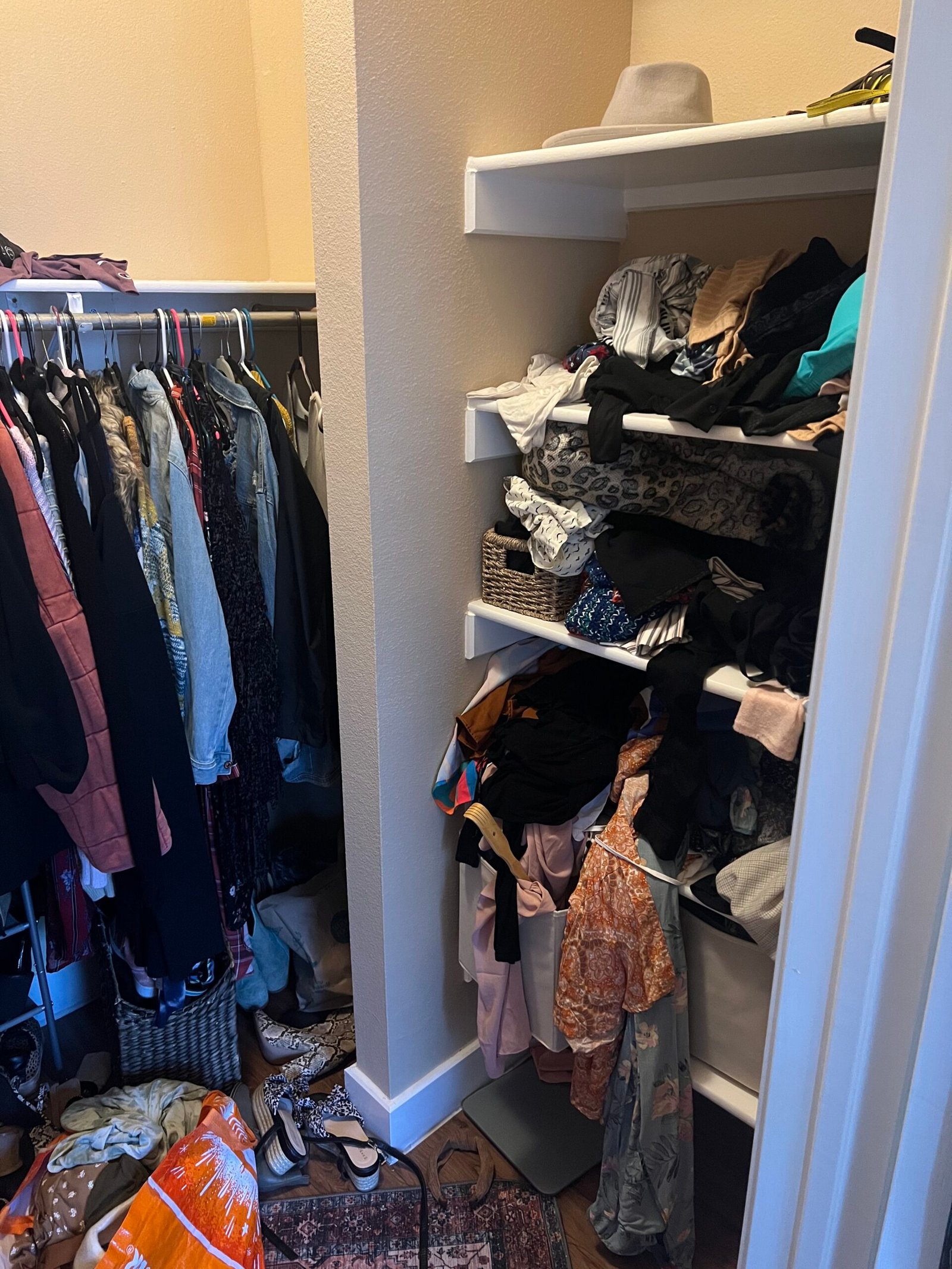 Cluttered closet before Top Tier Tidying organized it