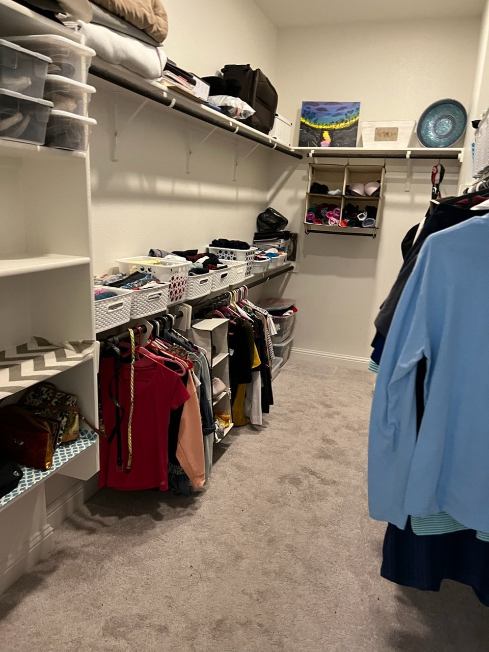 The same closet after professional organizing by Top Tier Tidying