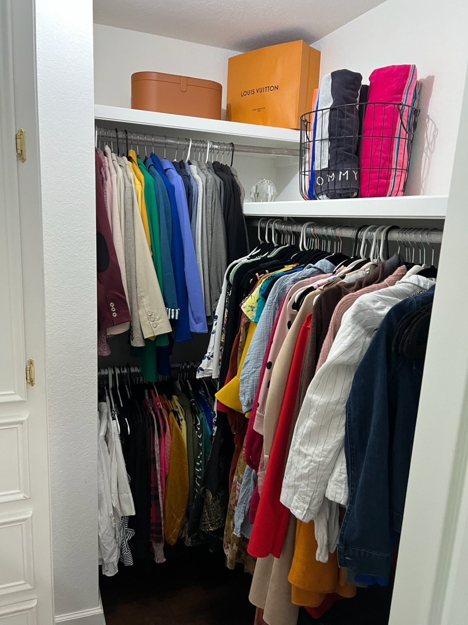 The same closet after professional organizing by Top Tier Tidying