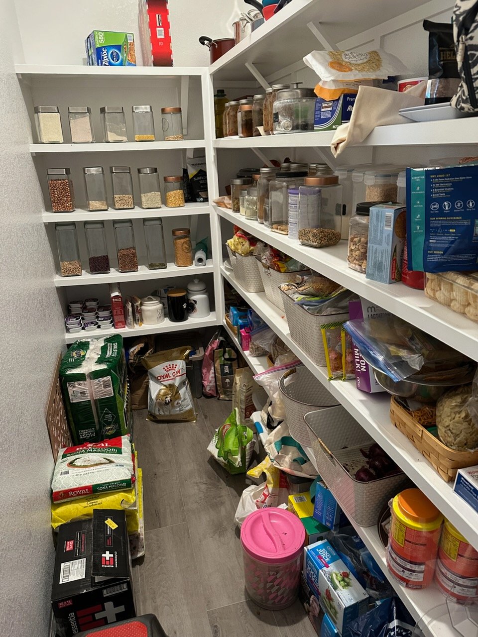 Cluttered pantry or kitchen before Top Tier Tidying organized it