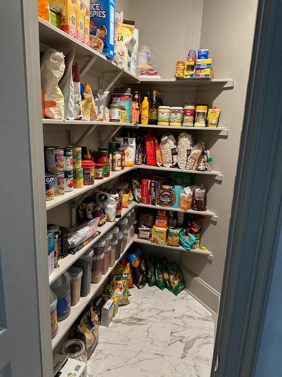 The same pantry or kitchen after professional organizing by Top Tier Tidying