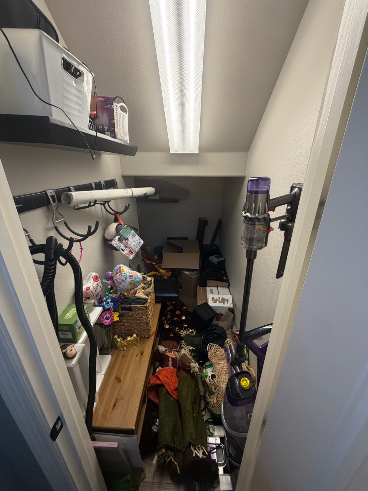 Cluttered garage before Top Tier Tidying organized it